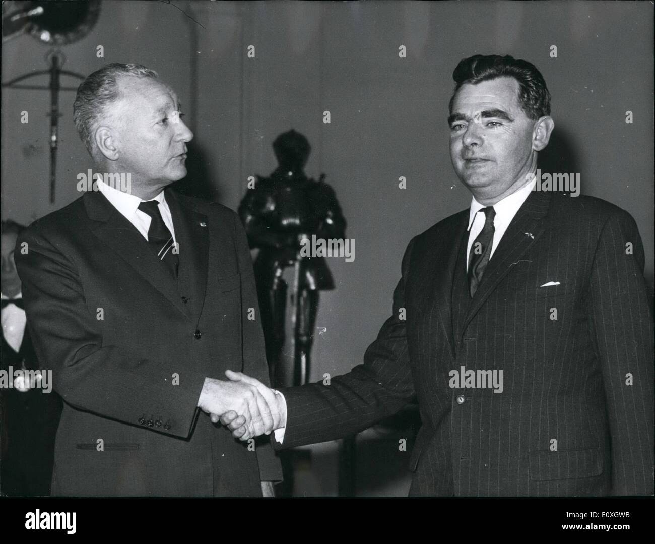 Dec. 12, 1966 - Belgian Defence Minister of Visit to Paris: Belgian Defence Minister M. Poswick who is now in Paris was received by M. Messmer, French Minister of the Armies, this morning. Photo shows M. Poswick (right) shaking hands with M. Messmer. Stock Photo