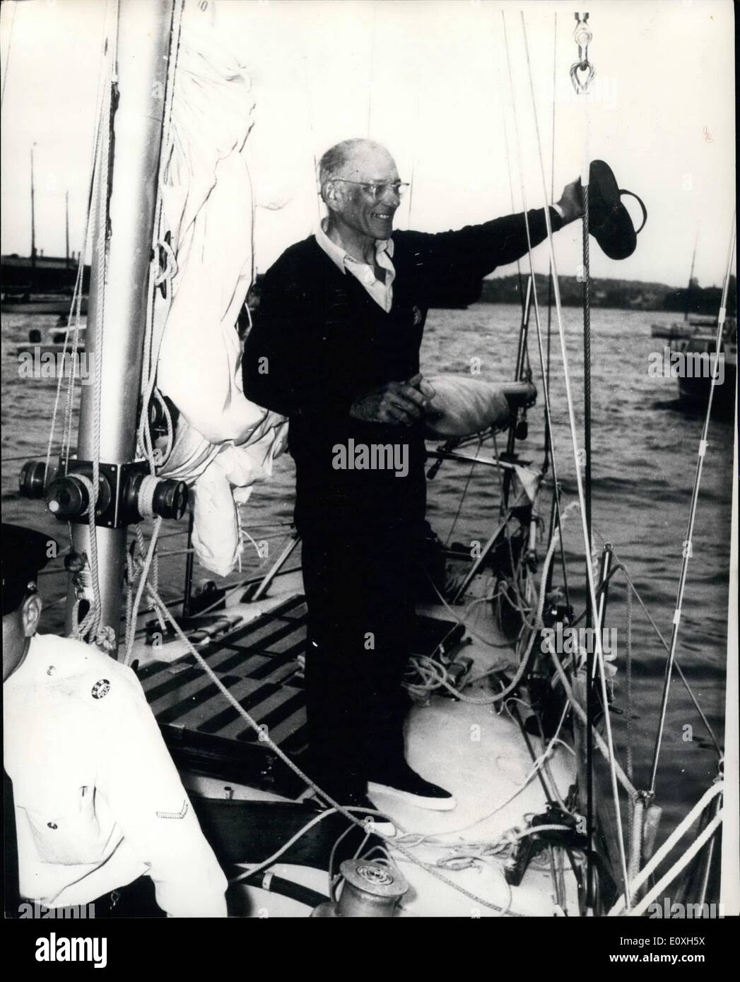 Dec. 12, 1966 - Francis Chichester Given Hero's Welcome In Sydney. Lone yachtsman Francis Chichester in his ketch Gipsy Moth IV, sailed triumphantly into Sydney Harbour, after his epic 13,750 mile voyage from Plymouth, England, which took him 108 days. Thousands of Australians crowding the shore gave him a heroes's welcome. Photo Shows: Francis Chichester, the lone yachtsman waves to the crowd from his ketch Gipsy Moth IV on his arrival in Sydney Harbour. Stock Photo