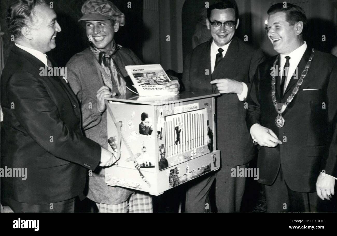 Oct. 15, 1966 - Vice Chancellor Dr. Erich Mende is seen here with an organ grinder at the Berlin ''Sportpalast.'' Dr. Mende was Stock Photo