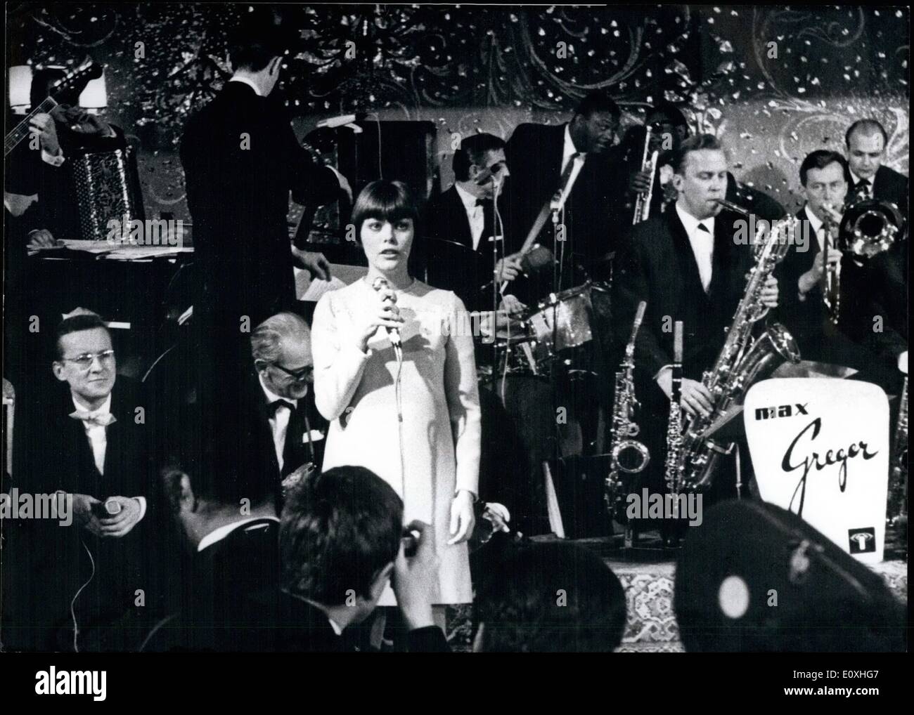 Jan. 01, 1967 - Carnival in Munich: One of the most important carnival- festivals of the german carnival took place on January 21. in Munich. The stars of the brilliant night were the famous ''queen of Jazz'' Ella FITZGERALD with Duke Ellington and his band , and the ''Little girl'' from Paris, MIREILLE Mathieu. More than one hundred stars all over the world were present. Picture shows MIREILLE Mathieu during her show. Stock Photo