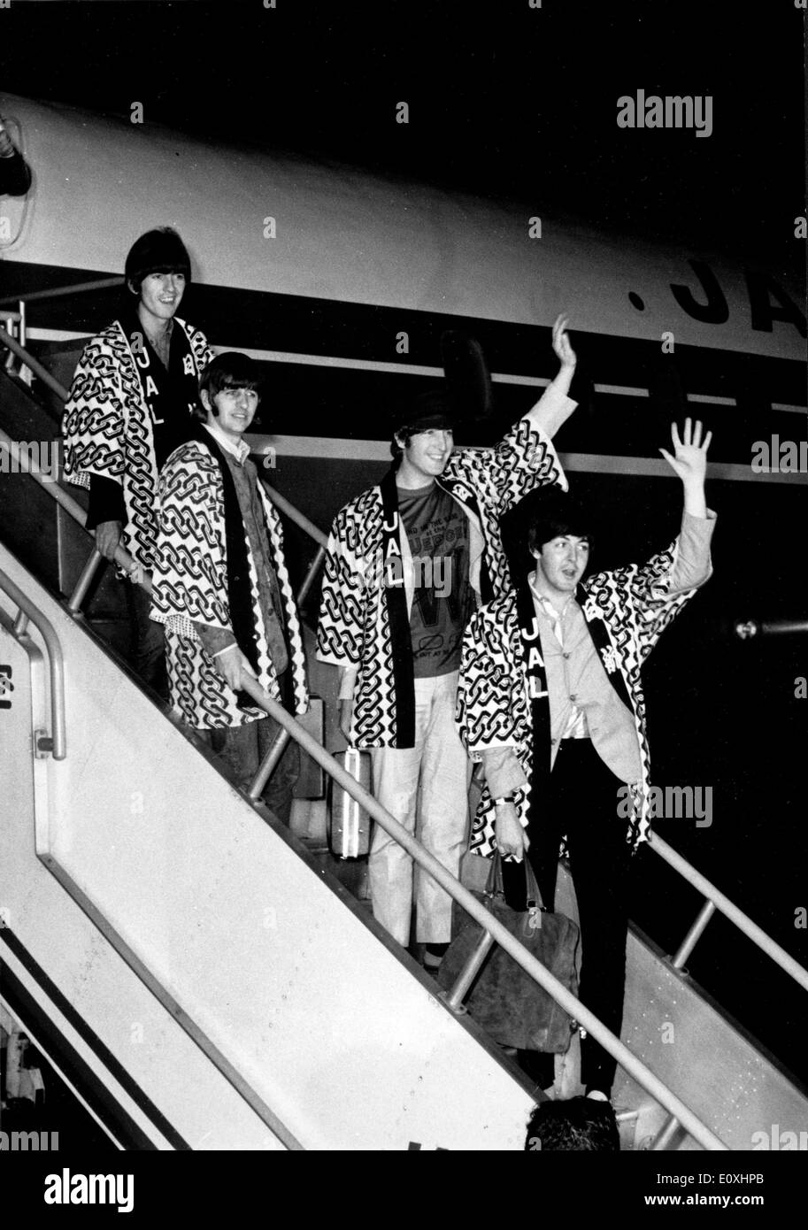 The Beatles arrive in Tokyo at four in the morning Stock Photo