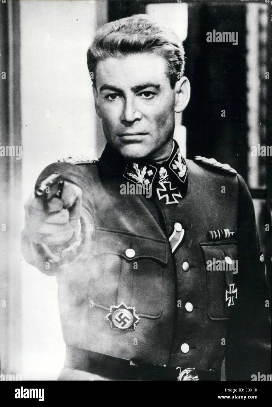Feb. 18, 1967 - A shot, but at whom? In probably the most unusual role yet of his entire career, Peter O'Toole plays a German divisional commander in World War II in the Anatole Litvak Sam Spiegel production ''Die Nacht der Generale.'' The story of this film, named after the Hans Helmut Kirst's book from which it originated, hands on three mysterious deaths, whose solving lasts more than two decades. Appearing alongside him in other major roles are: Omar Sharif, Tom Courtenay, Donald Pleasence, Joanna Pettet, Charles Gray, and Philippe Noiret. Stock Photo