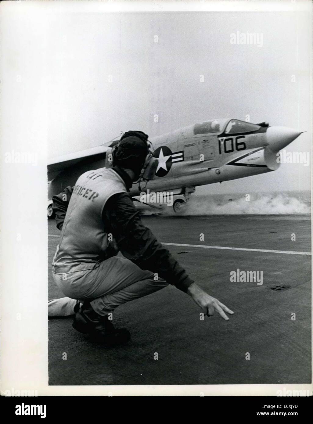 Mar. 03, 1967 - South China Sea ? Getting the launch signal from the catapult officer, an F-8 Crusader Pilot prepares to follow Stock Photo