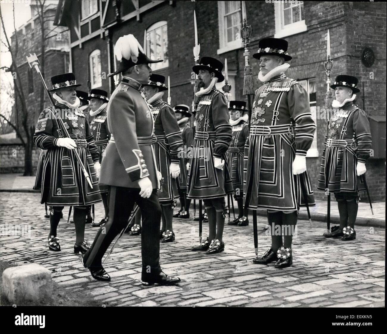 Mar. 03, 1967 - Easter Day Parade At The Tower: The Easter Day Parade took place today at the Tower of London when Yeomen Warders were inspected by the Resident Governor, Col. Sir Thomas Butler, prior to marching to the Chapel Royal of St. Peter Ad Vinula for the services. Photo Shows: col Sir Thomas Butler, the Resident Governor, inspecting the Yeomen Warders at the Tower today. Stock Photo