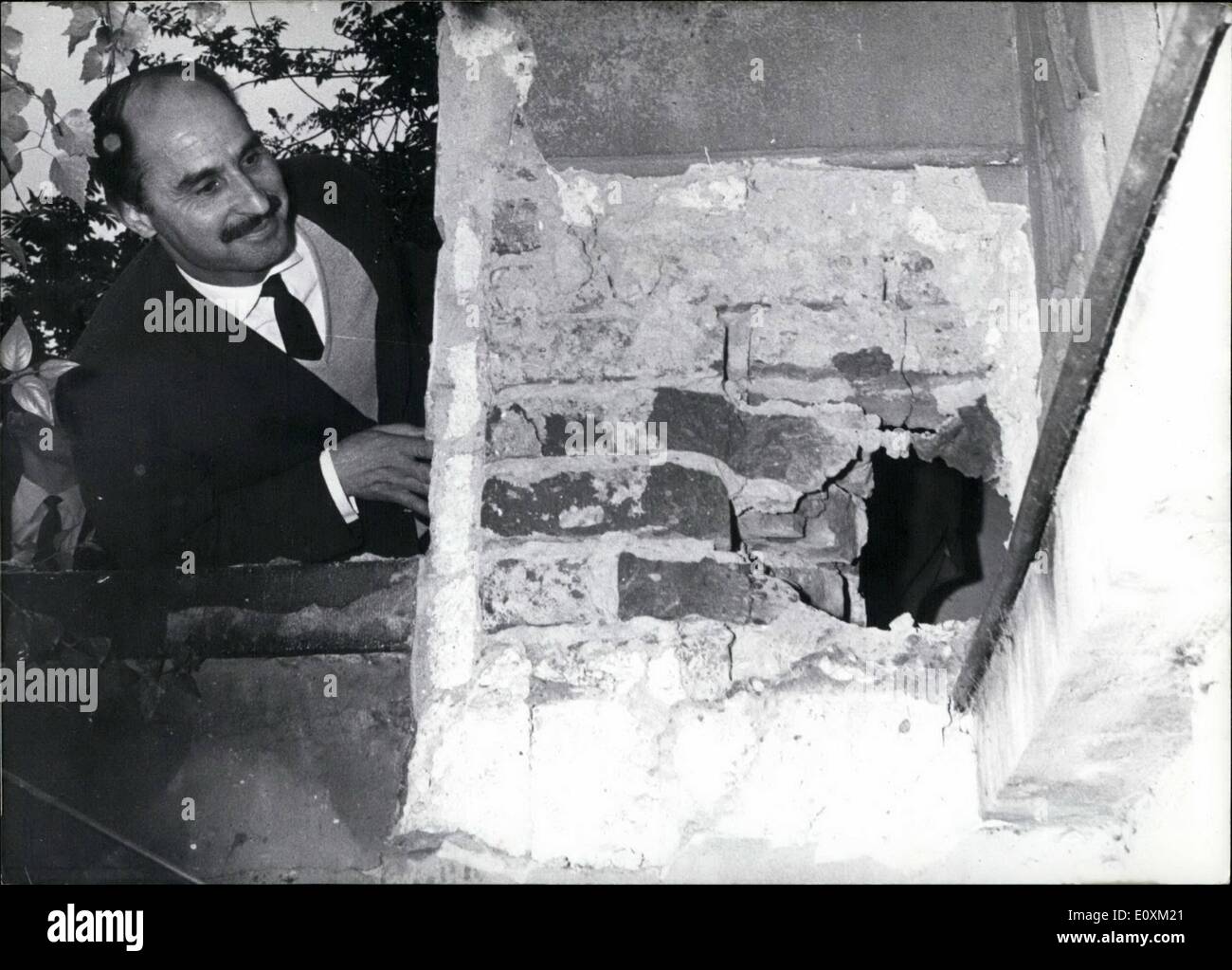 May 05, 1967 - In the nicht 24./25. May at 2.18 o'clock at plastic bomb exploded at the entrance of the Spanish embassy in Bonn, ''Schlob'' - Street No. 4. The bomb demolished the heavy oak door of the embassy. It snatched away an iron-grate and made an opening into a 26 centimetres thick house wall. The expansion of the explosion threw the Spanish porter Ramon de la Torre out of his bed. The employee of the embassy, Mario Clari, got off with a fright. Photo shows the Spanish employee of the embassy, Ramon de la Torre. Stock Photo