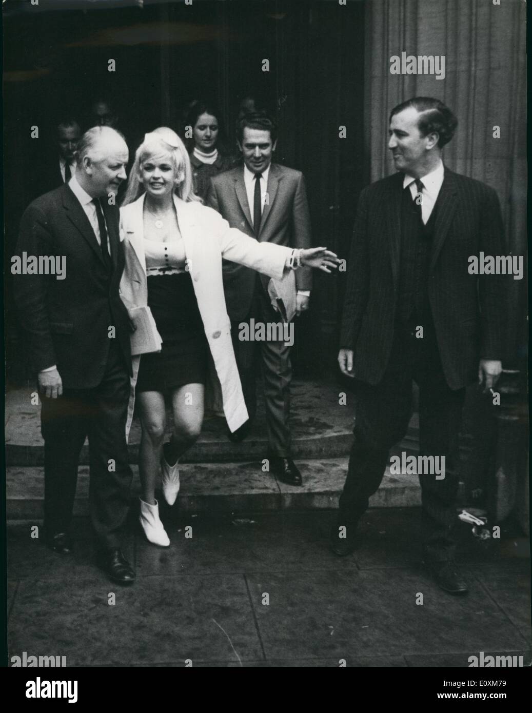 Apr. 04, 1967 - Jayne Mansfield Visits House of Commons: Jayne Mansfield, the American star, visited the House of Commons yesterday and brought the proceedings to a halt while the speaker called for order. Jayne sat in the seat usually used by the Prime Minister's wife. She were a low cut blouse and mini-skirt - ''the most conservative I've got.'' Miss Mansfield was the guest of two Conservative Whips, Mr. Timothy Kitson (Richmond, Yorks), and Mr. Robet Elliott (Newcastle, North). When I went into the Speaker's Gallery,'' she said, ''lot of heads turned and gave me smiles Stock Photo