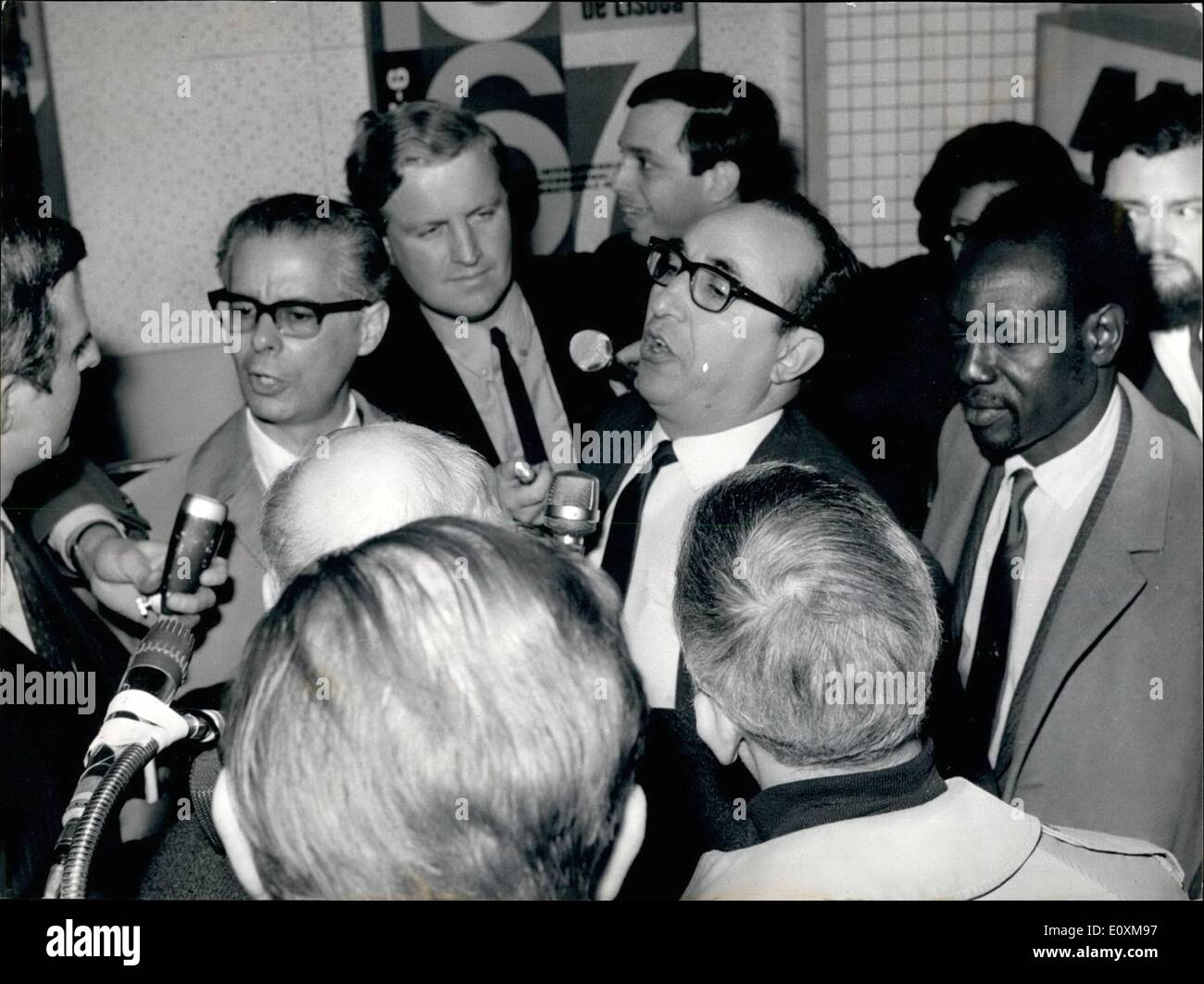 Apr. 04, 1967 - The Uno commission for Aden arrived at Geneva The Uno Commission which left Aden because of alleged non-cooperation from the British has arrived at Geneva, where they will make up their report. Photo shows The Uno Aden-commission arriving at Geneva airport, where journalists were eager to question them. From left to right (both with spectacles) Dr. Manuel Guerrero (Venezuela, head of the commission), Abdul Shalizi (Afghanistan) and Mussa Keita (Rep. of Mali) Stock Photo