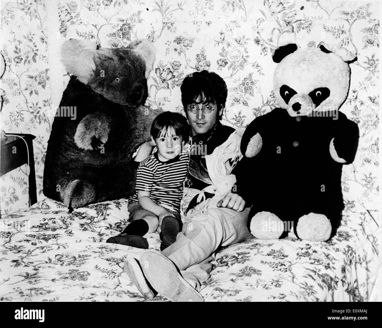 Singer John Lennon with his son Julian and his teddy bears Stock Photo