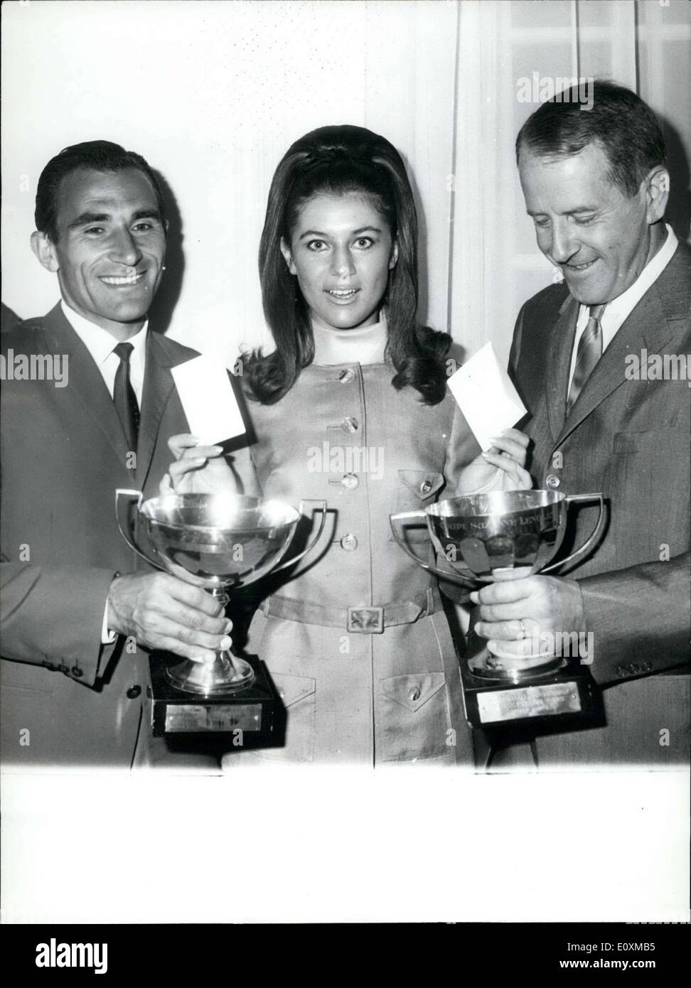 May 18, 1967 - The young singer Sheila drew the second round of the Davis Cup, an international tennis competition, in which France and Hungary will compete. Pictured: During the random drawing, from left to right, Gulyas, Sheila, and Bernard, Captain of France's team. Stock Photo