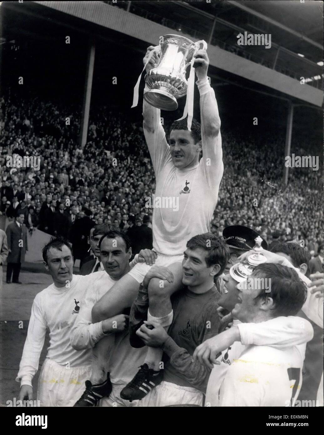 May 20, 1967 - F.A. CUP FINAL AT WEMBLEY. TOTTENHAM BEAT CHELSEA 2-1 TO WIN  THE CUP. PHOTO SHOWS: MACKAY, the Spurs captain, helds the F.A. Cup aleft  as he is chaired
