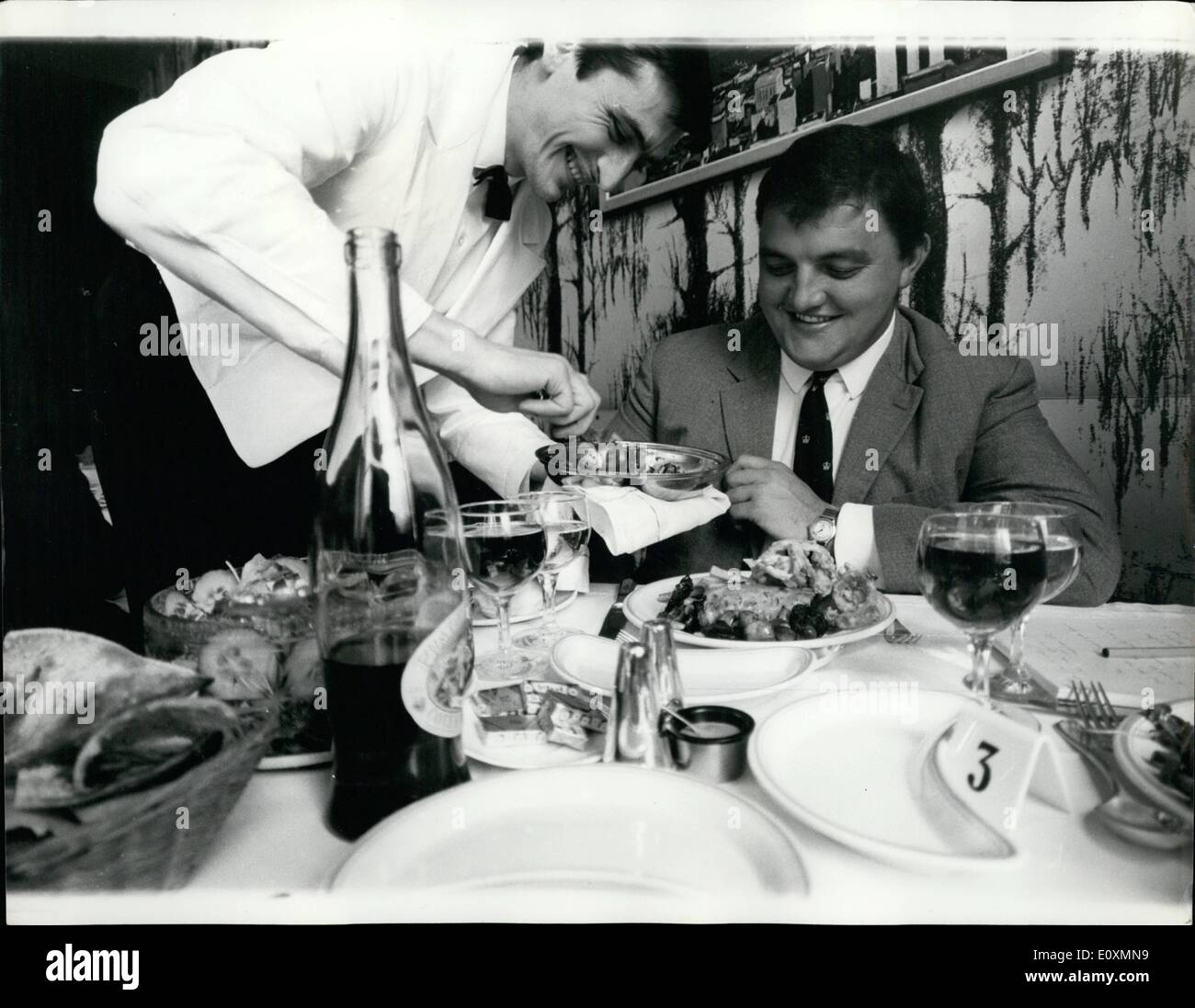 Apr. 04, 1967 - 18 1/2 Stone Of Cricket Talent: It is eight days to the beginning of the cricket season, and pictured here enjoying a meal is 25-year old Northamptonshire cricketer, Colin Milburn - 18 1/2 stone of cricket talent. he said all this talk of ''Lose weight if you want to regain your Test place'' came form newspapers - never officially from the M.C.C. or selectors. ''I mean, if that's when they really felt, of course, I would go on a diet... but it would be hard. The way I am now I go to the wicket and I am balanced. balance means a lot and if I weighed two stone less it might go Stock Photo