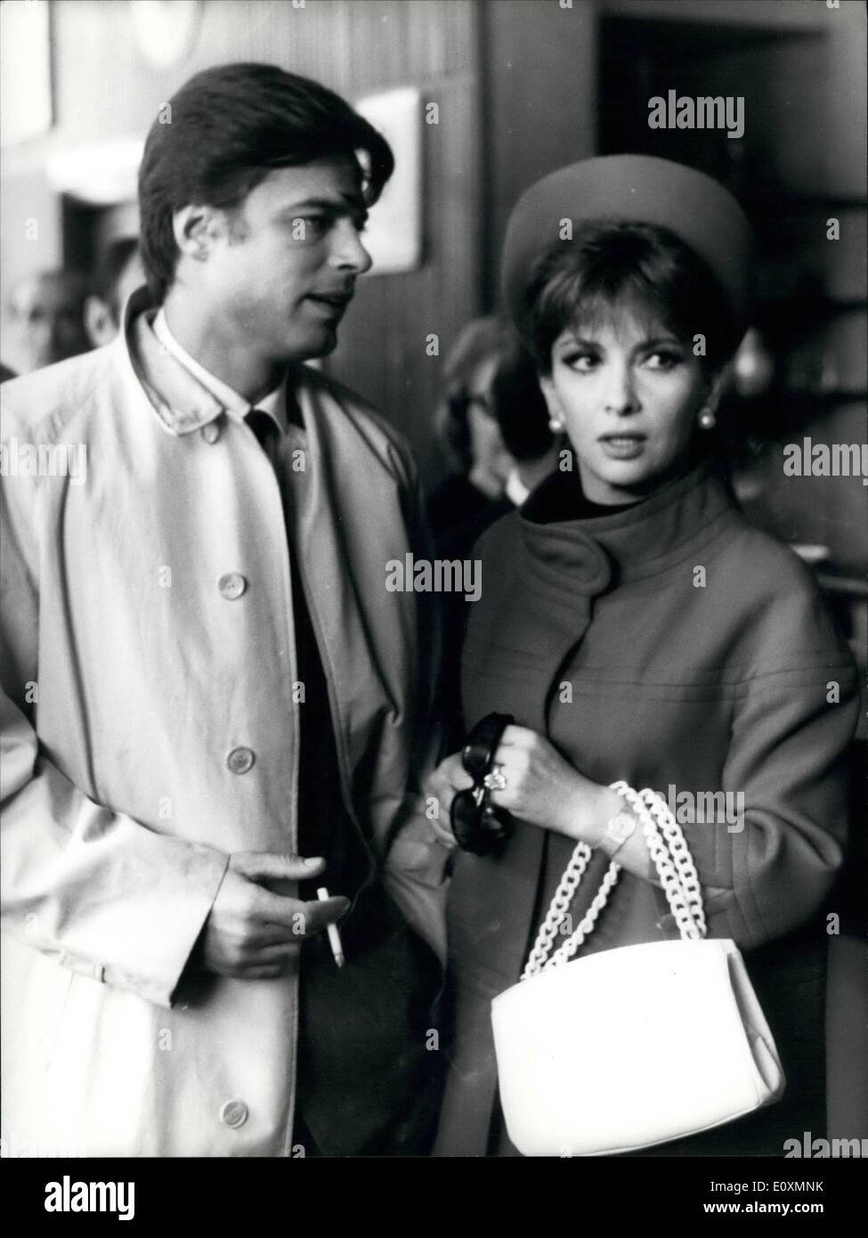 Apr. 04, 1967 - Italian actress Gina Lollobrigida and French actor Jean Sorel went to the Court for the trial of appeal. They are accused to work in the film ''Le Bam bole'' (the dolls), in a scene considered immoral by the Court. The first court condamned them to two months of reclusion. Photo shows Gina Lollbrigida and Jean Sorel outside the Court. Stock Photo