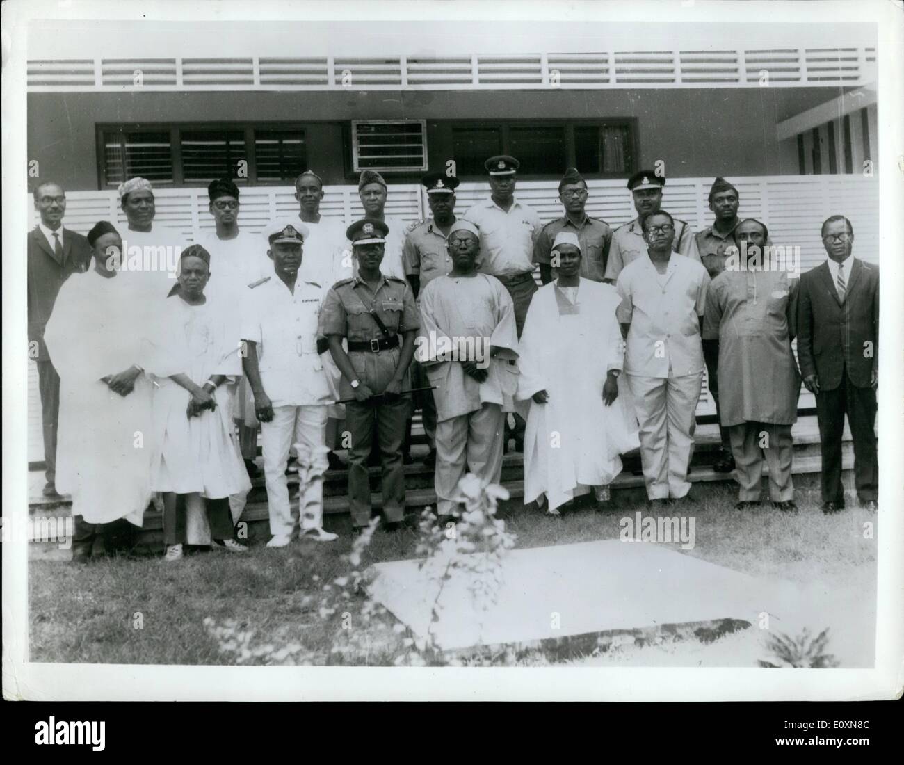 Jun. 06, 1967 - The Nigerian had of State, Major-General Yakubu Gowon on June 12th 1967 formed an Army-Civilian Federal Executive Council, In which are 16-man full-time cabinet for the Nigerian Federation. Members of the cabinets are known as ''commissioners''. Here members of the enlarged Federal Executive Council pose for a photograph with General Gowon after their inaugural in Lagos. Photo shows. Standing from the left to right: Front Row Alhaji Ali Monguno; Alhaji Aminu KAno; Commondore J.E.A Stock Photo