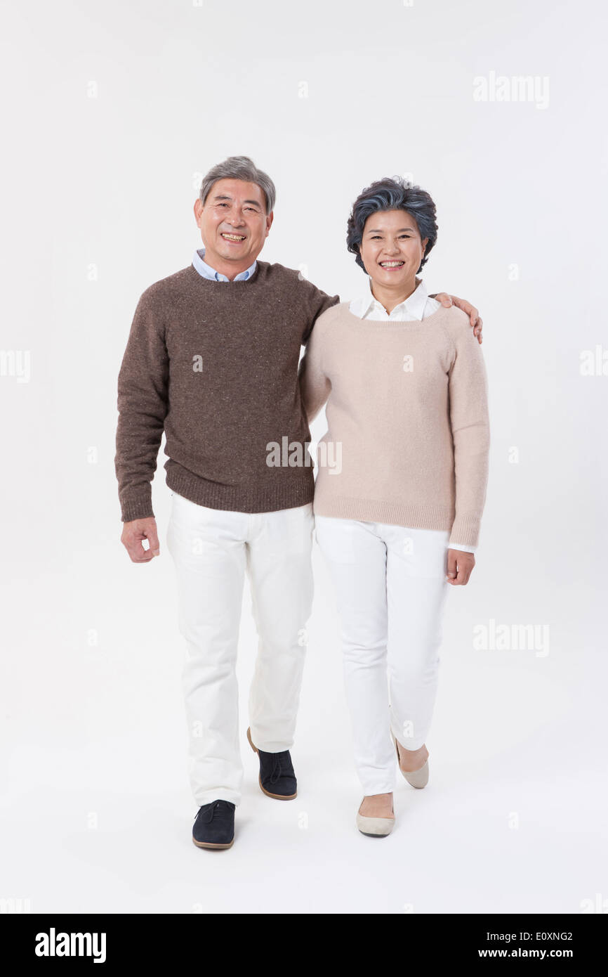 Asian old couple walking hi-res stock photography and images - Alamy