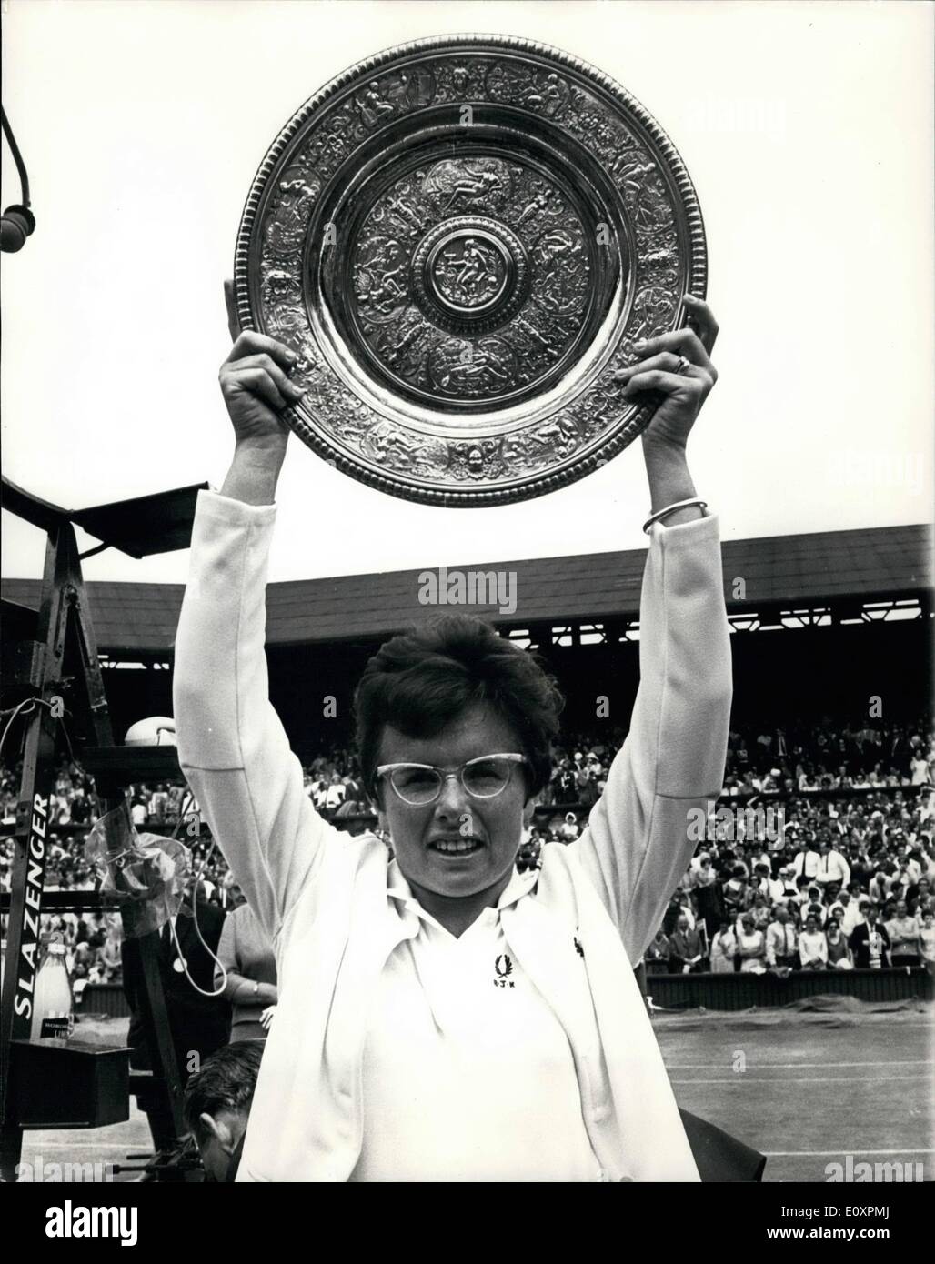 Jul. 07, 1967 - Tennis at Wimbledon, Miss King (USA) beat Ann Jones (GB). In the ladies singles final at Wimbledon today Mrs. Billie Jean King (holder) from America beat Ann Jones (GB) 6-3, 6-4. OPS: Billie Jean King hold up high the trophy after winning the ladies singles final at Wimbledon this afternoon. Stock Photo