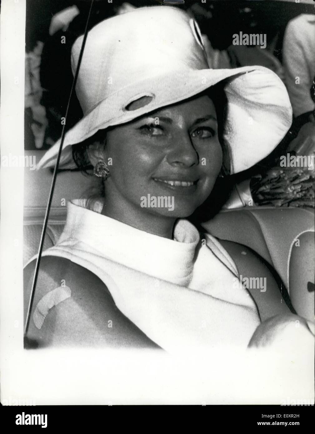 Oct. 10, 1967 - Princess Soraya in Arguement at Sydney airport- Princess Soraya , former wife of the shah of Iran, argued for two hours at sydney Airport today with quarantine officials before she agreed to have a cholera injection . Princess Soraya had flown in from bangkok a cholera area, and her medical papers showed no record of a recent injection . The 34 year old princess was near tears as she left the quarantine room with a plaster on her arm. She is in Australia for a 10day visit to raise money for a children's medical research foundation Stock Photo