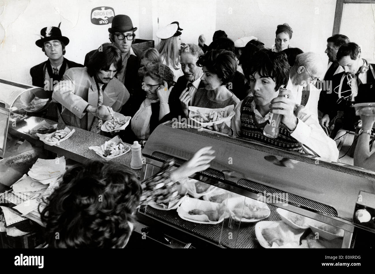 The Beatles order fish and chips while filming show Stock Photo