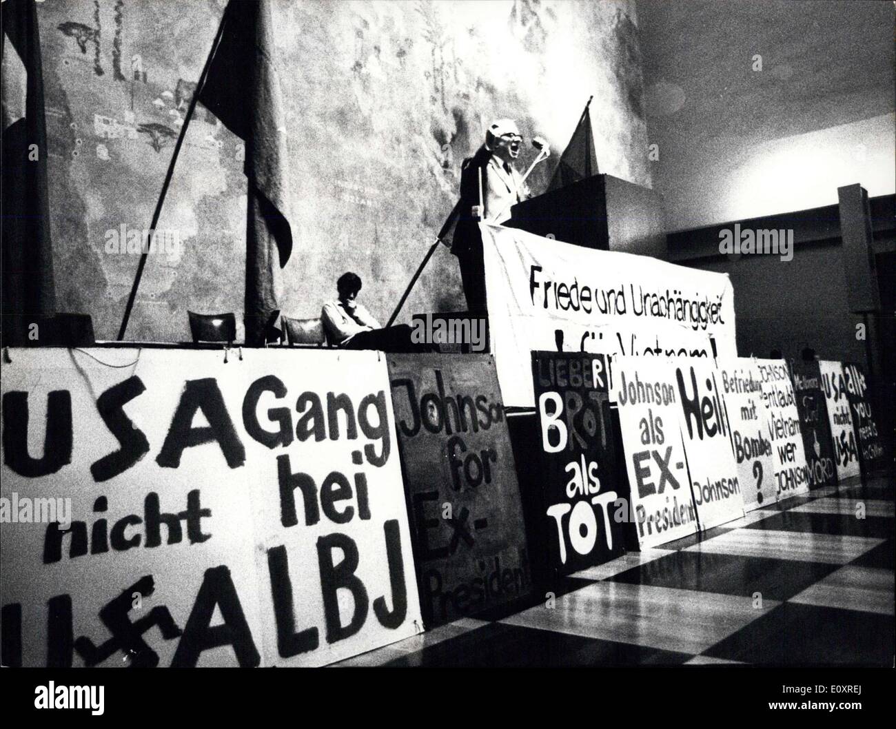 Oct. 21, 1967 - Demonstration against war in Vietnam at Zurich: Like in many other cities around the world demonstrations against American war in Vietnam took place on Saturday. Photo Shows Member of parliament Erwin A. Lang during his speech behind a wall of posters. Stock Photo