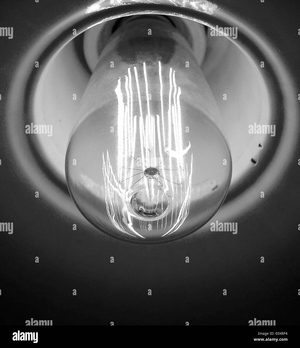 Nostalgic light bulb with clear tungsten wires closeup Stock Photo Alamy