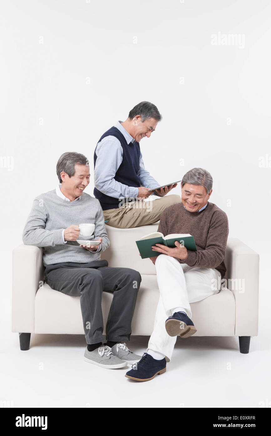 three old men on a couch Stock Photo - Alamy