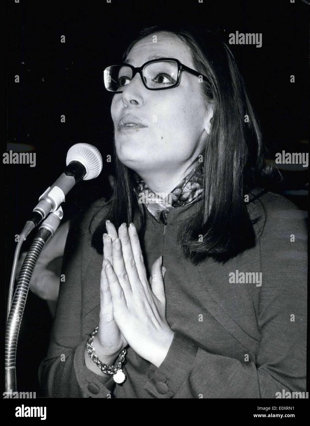 Oct. 24, 1967 - Singer Nana Mouskouri will appear on stage in a red velvet dress on the stage of the Olympia on October 26th. After her recital, nana Mouskouri will have many good reasons to take a break. Her first child is due in February. Picture: Nana Mouskouri during a rehearsal. Stock Photo