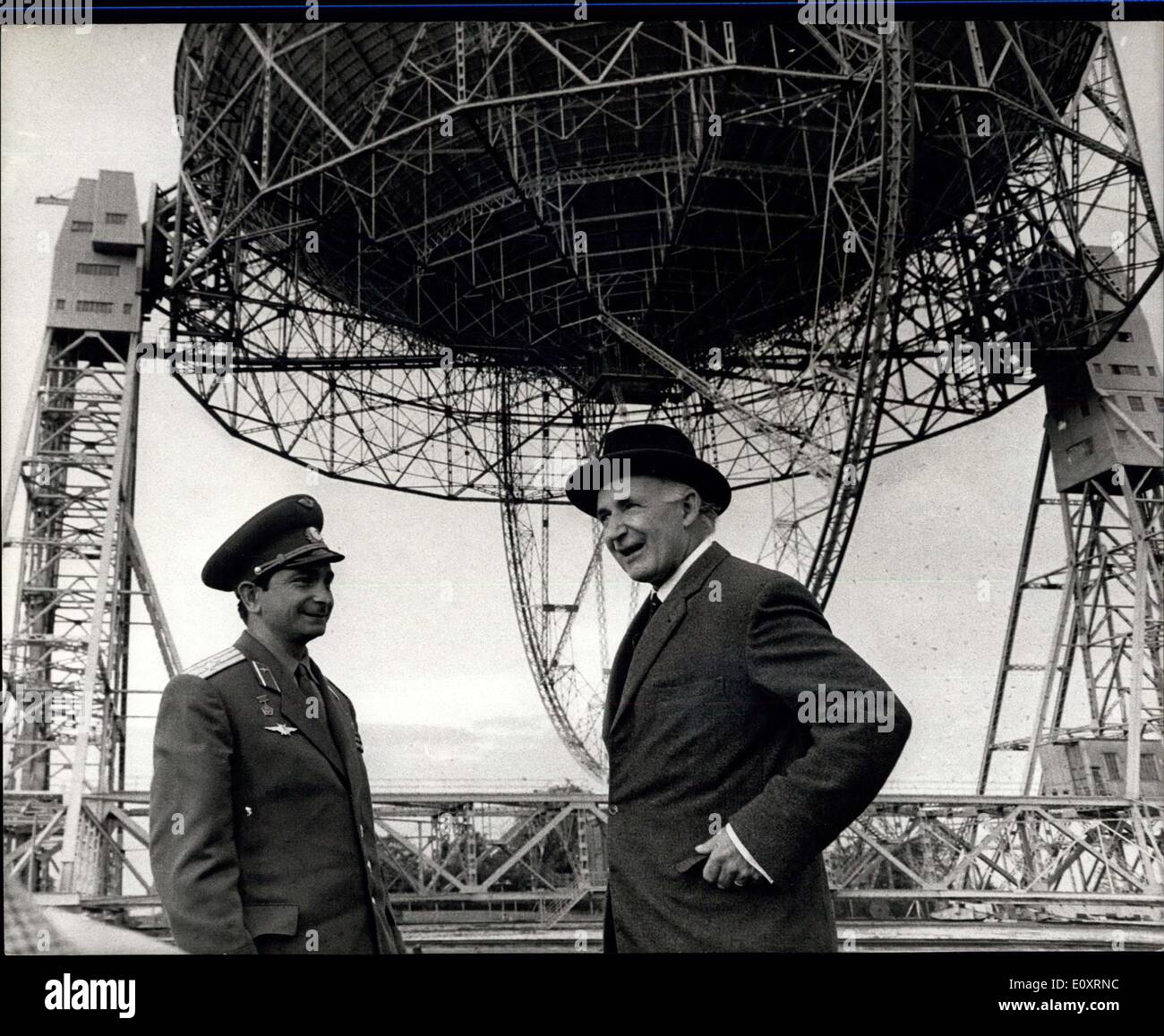 Oct. 26, 1967 - Soviet Spacemen sees Britain's giant Radio Telescope at Jodrell Bank : Soviet Cosmonaut Lt. Col. Valery Bykovsky who is currently on a seven day visit to this country, today paid a visit to Jodrell Bank, where he saw Britain's giant radio telescope. In 1963 Bykovsky was launched into later by the Soviet woman cosmonaut Valentina Tereshkova in Vostok 6. Photo shows Soviet cosmonaut Lieut. Col. Valery Bykovsky is seen with Sir Bernard Lovell during his visit to Jodrell Bank. Stock Photo