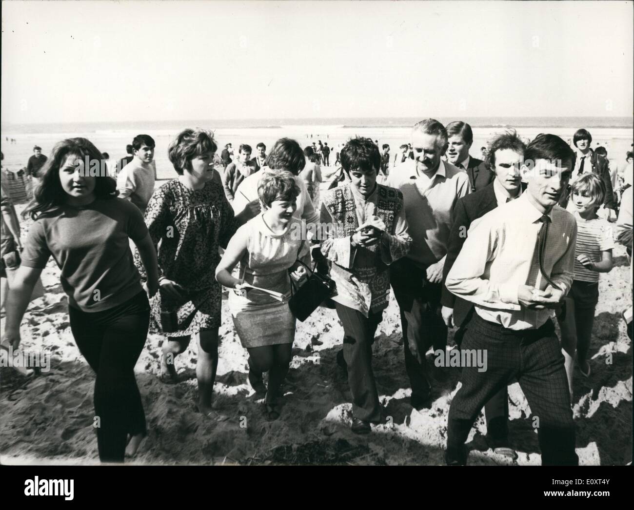 Sep. 09, 1967 - The Beatles in the West Country. The Beatles are in the West Country on their ''Magical Mystery Tour'' coach trip on which they are making an hour-long colour TV film. Photo shows Paul McCartney in the midet of a crowd of holiday-makers at Newquay, Cornwall, yesterday. Stock Photo
