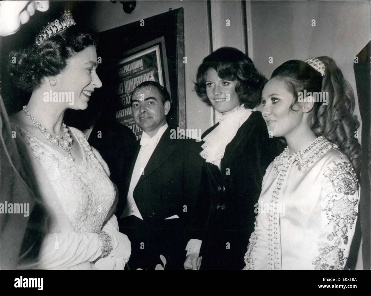 Nov. 11, 1967 - Royal Variety Performance: H.M. The Queen, accompanied by Prince last night attended the Royal Variety Performance, at the London Palladium.After the show, the performer were presented to her Majesty. Phot Shows The Queen talks to pop singers, Lulu (on right), ad Sandie Shaw, after last night's Royal Variety Performance. Stock Photo