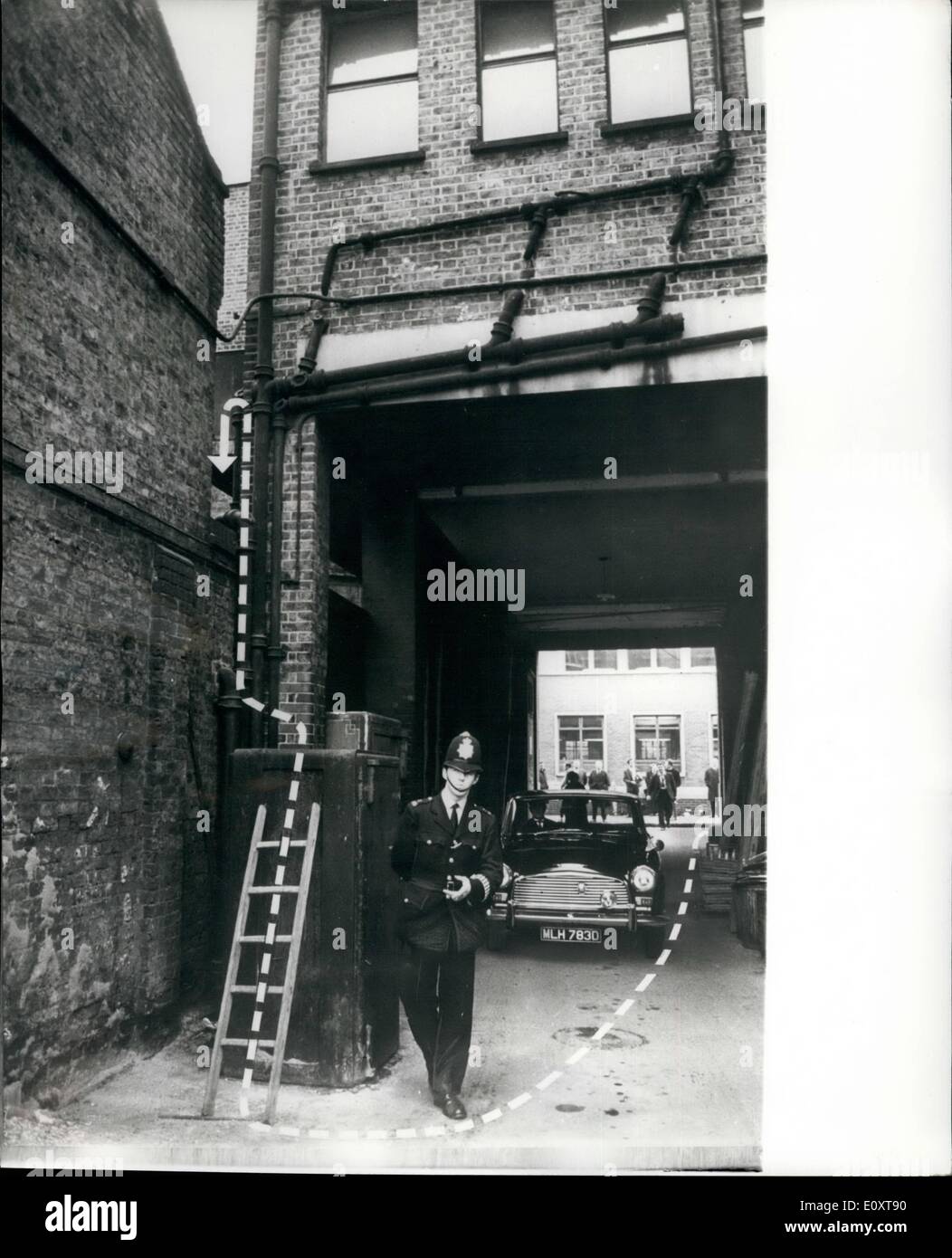 Nov. 11, 1967 - GANG BURN WAY INTO STRONGROOM. Thermic lances capable of burning through steel and conorets at temperatures of up to 2,500 degrees Centigrade were used in a raid on the London Co operative Society strongroom. In the carefully planned robbery, whioh took 30 hours over the week end, and was discovered yesterday, the thieves burned through a 2ft. steel sour and rifled ,bout 120 private deposit boxes. No one knew yesterday just how much the gang had stolen; only the depositors themselves eta say what was in their boxes Stock Photo