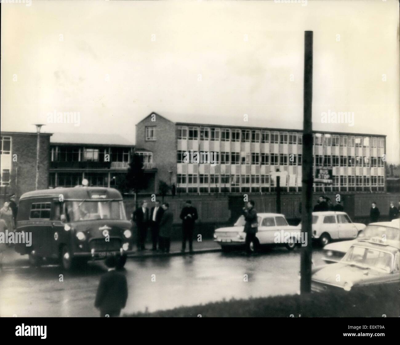 Nov. 11, 1967 - Teachers Dies in Classroom Hold-Up.: A young man armed with a shotgun, held a class of 14 girls and a teacher hostage today in their needle work class for two hours, blasting away at anybody who tried to enter the classroom. One of the shots that he fired hit and fatally injured the teacher, identified as Mrs. Hansen 26, who died in Dundee Hospital from gunshot wounds. The school is the St. John's Roman Catholic Secondary School, Dundee. The man, not yet named, surrendered to police after they had moved in with dogs and metal shields Stock Photo