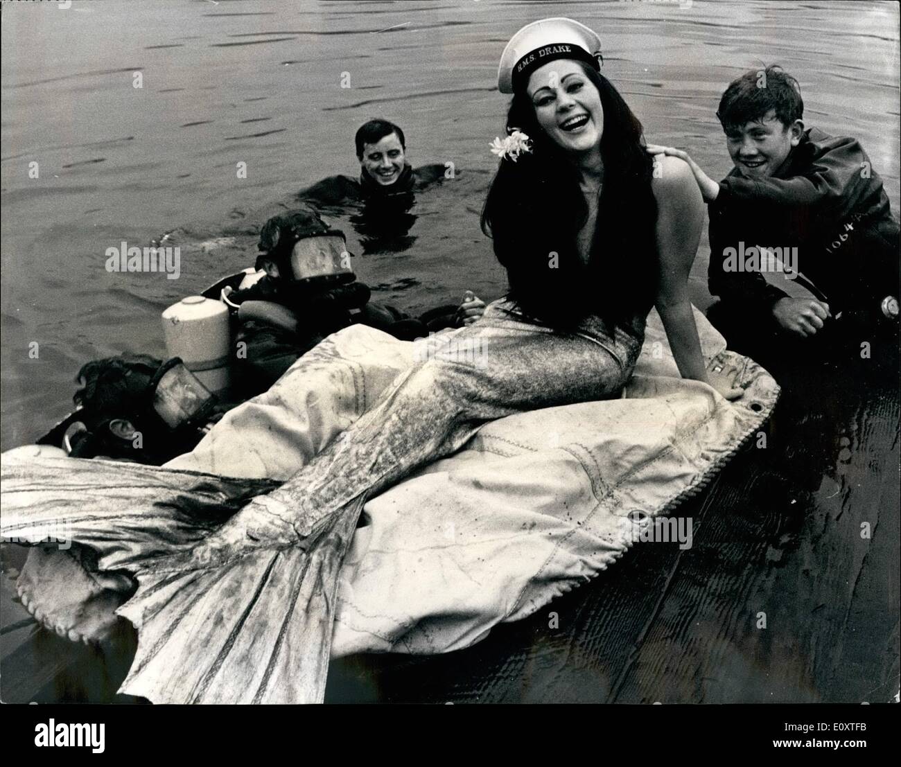 Nov. 11, 1967 - 'Mermaid' visits royal navy's Plymouth command diving school: 22-year old Anne Furness, westward television's resident mermaid in an angling quiz show called 'take the Bait'' paid a visit to the royal navy's Plymouth command diving school. Anne, whose home town is Bridlington, yarks, but is now living at st. Eval, Cornwall, was invited to spend a day at the diving school after the divers saw her programme. Photo shows ''Mermaid'' Anne furness is pictured at the R.n Stock Photo