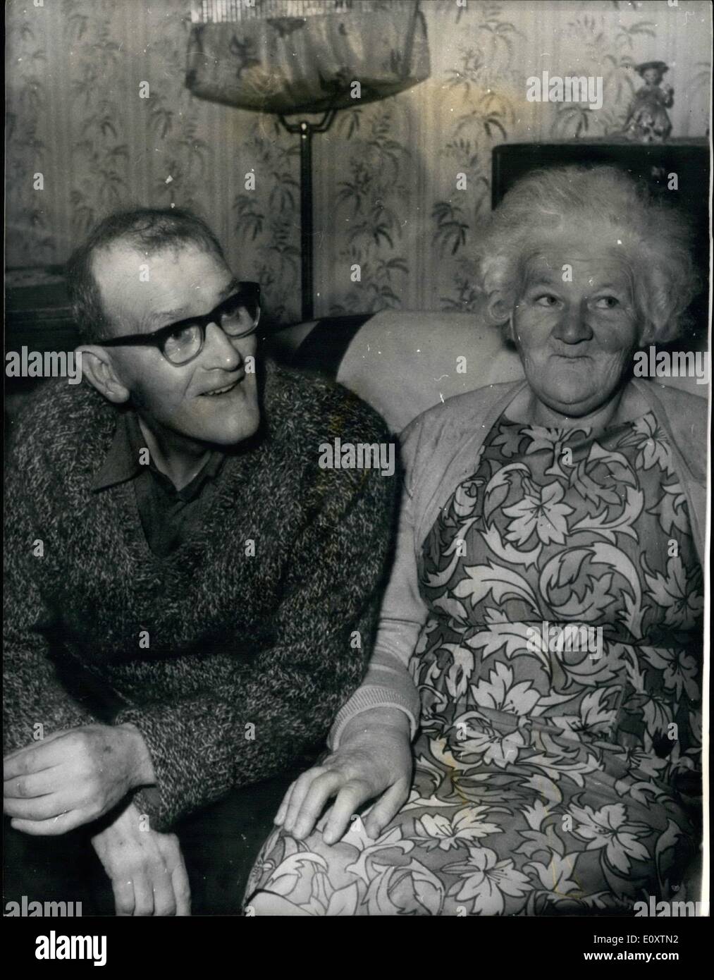 Sep. 09, 1967 - Six die in blazing Colliery disaster in Scotland: Two miners were rescued yesterday after being trapped underground for nearly 12 hours by a fire Michael Colliery, one of Scotland's biggest wines in East Wemyss, Fife. Six men are known to have died and escaped from fire. Photo shows 62- year old John McArthur, one of the miners who was rescued from the blazing pit after being trapped for nearly 12 hours, is pictured at home with his wife after his terrible ordeal. Stock Photo