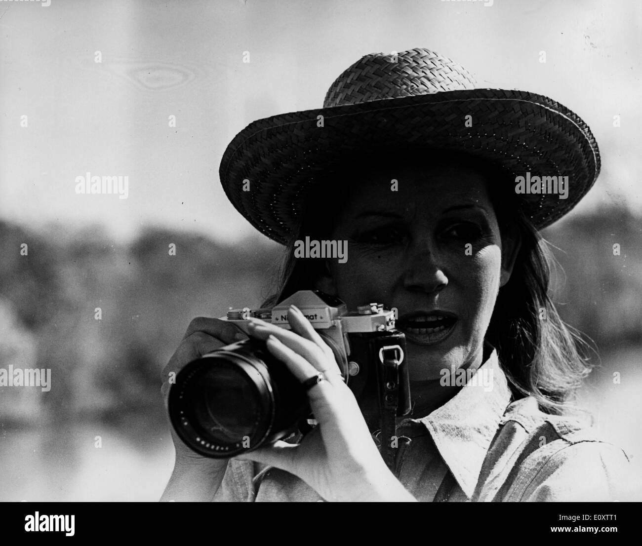 Actor Roger Moore's wife Luisa Moore taking pictures Stock Photo