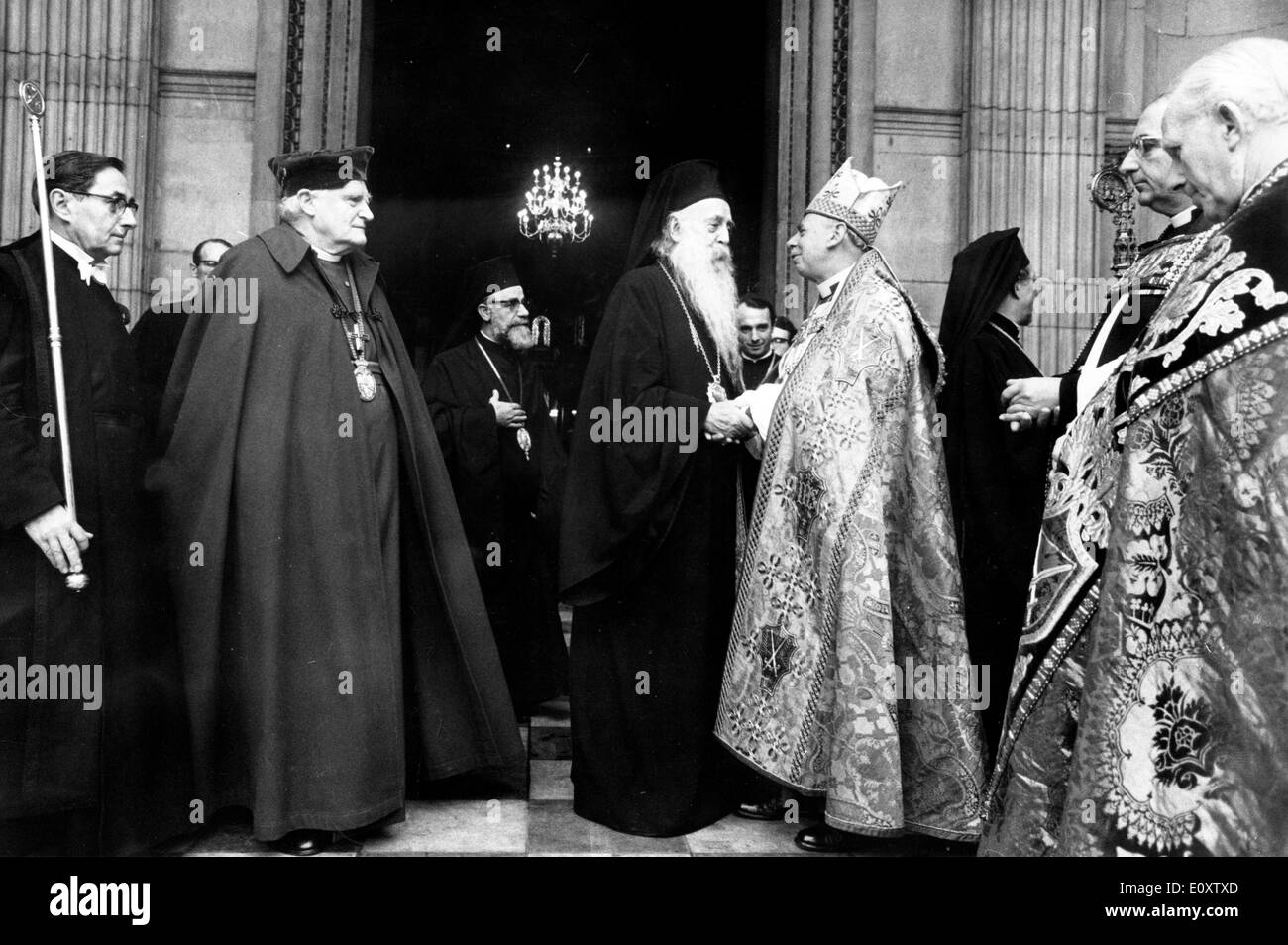 Nov 14, 1967; London, UK; His all Holiness PATRIARCH ATHENAGORAS I, Archbishop of Constantinople and Oecumenical Patriarch, yesterday visited St. Paul's Cathedral to be conducted to the High Altar where the Book of Gospels was opened for him to kiss. The Patriarch is the guest of the Archbishop of Canterbury and is staying at Lambeth Palace. The picture shows the Patriarch saying goodbye to the Bishop of London, Dr. ROBERT STOPFORD, whilst the ARCHBISHOP OF CANTERBURY, Dr. RAMSEY (L), looks on. Stock Photo