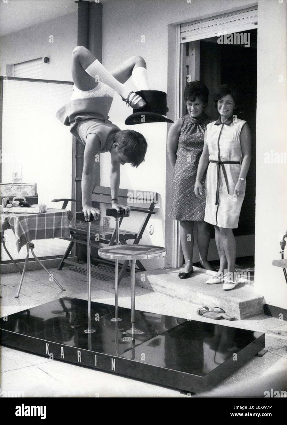Sep. 30, 1967 - Pictured is 11 year old Karin Jung as she practices not for the circus, but rather to prepare for the German Youth Sports Championships held in W?rttemberg's Allershausen. The young champion from Augsburg has to defend her title atop the podium in her discipline. Her mother(pictured) is her trainer and her 17 year old sister(pictured) was also a gymnast. Stock Photo