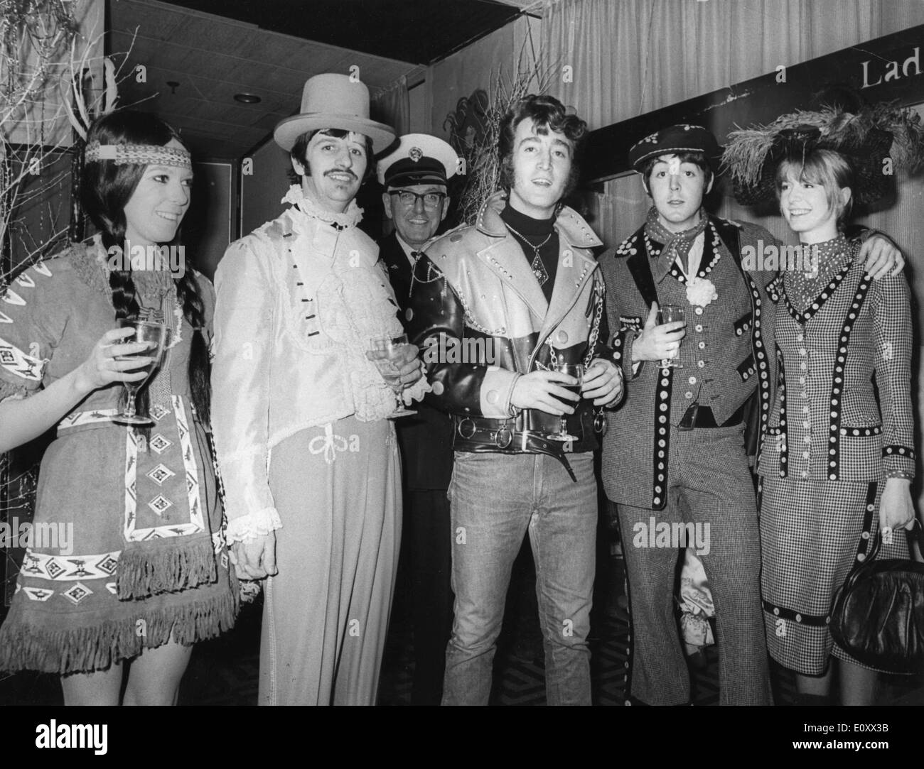 The Beatles wearing costumes at a party they threw Stock Photo - Alamy