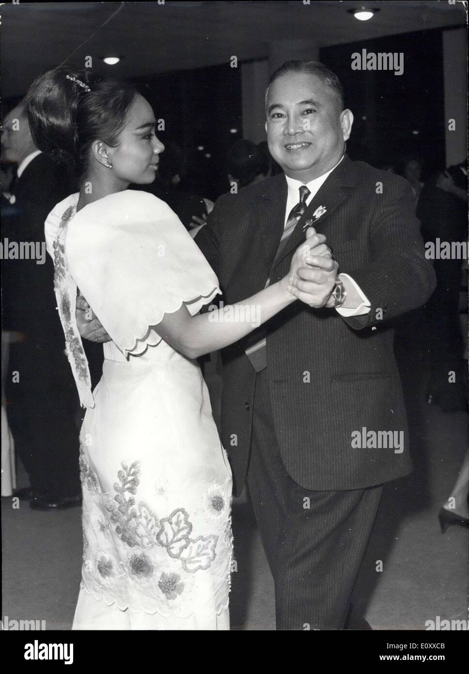 Dec. 13, 1967 - Dancing Ambassador: Manilla dancers who are now performing in Paris were guests at the Philippine Embassy last night. Photo shows Ambassador Jose Alejandrino dancing with the star dancer of the Manilla Ballet company. Stock Photo