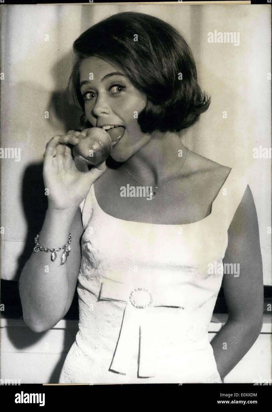 Mar. 09, 1968 - Wencke Myrhe bites into the sour apple! The cheeky Norwegian will represent Germany at the Eurovision competition on April 6 in London. Will she succeed in landing in one of the top spots with the Horst Jankowski composed ''Ein Hoch der Liebe?'' To date no German participant has succeeded at the Eurovision contest, - they have always ran a poor second. Wencke is the first foreign singer to come out with a German song in this competition Stock Photo