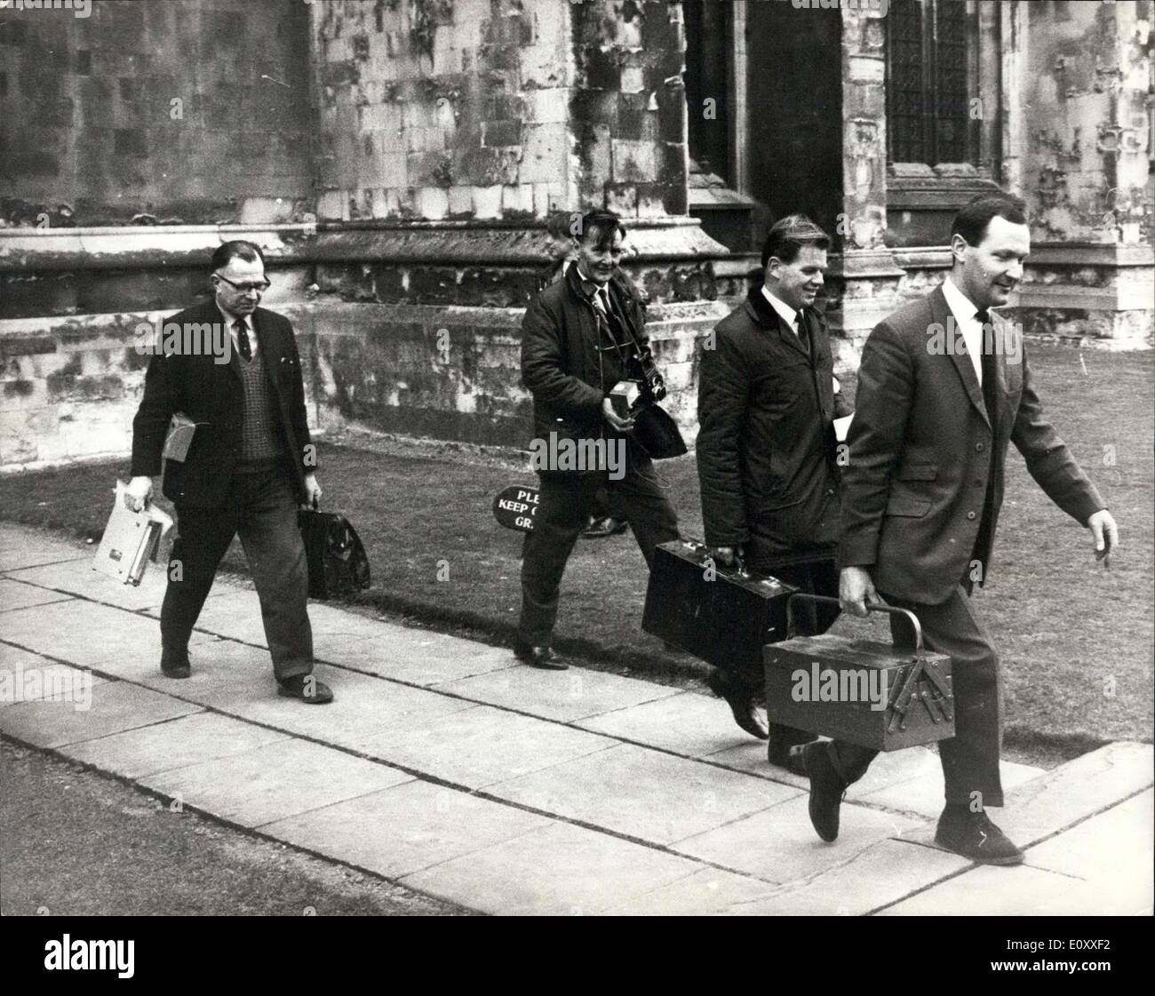 Mar. 16, 1968 - Gang Raid Canterbury Cathedral : A gang broke into Canterbury Cathedral early yesterday and stole antique silver worth ?17,000. One of the stolen items was a 15th century Italian processional cross worth ?5,000. The gang got into the Cathedral by forcing a gate into the cloisters and smashing through an Oak door. Then they tried to blast open two safes which contain the the cathedral's most valuable treasures, but they were uncleared the cathedral until a scientist from Scotland Yard's forenslo laboratory made the gelignite safe. Photo shows The C.I.D Stock Photo