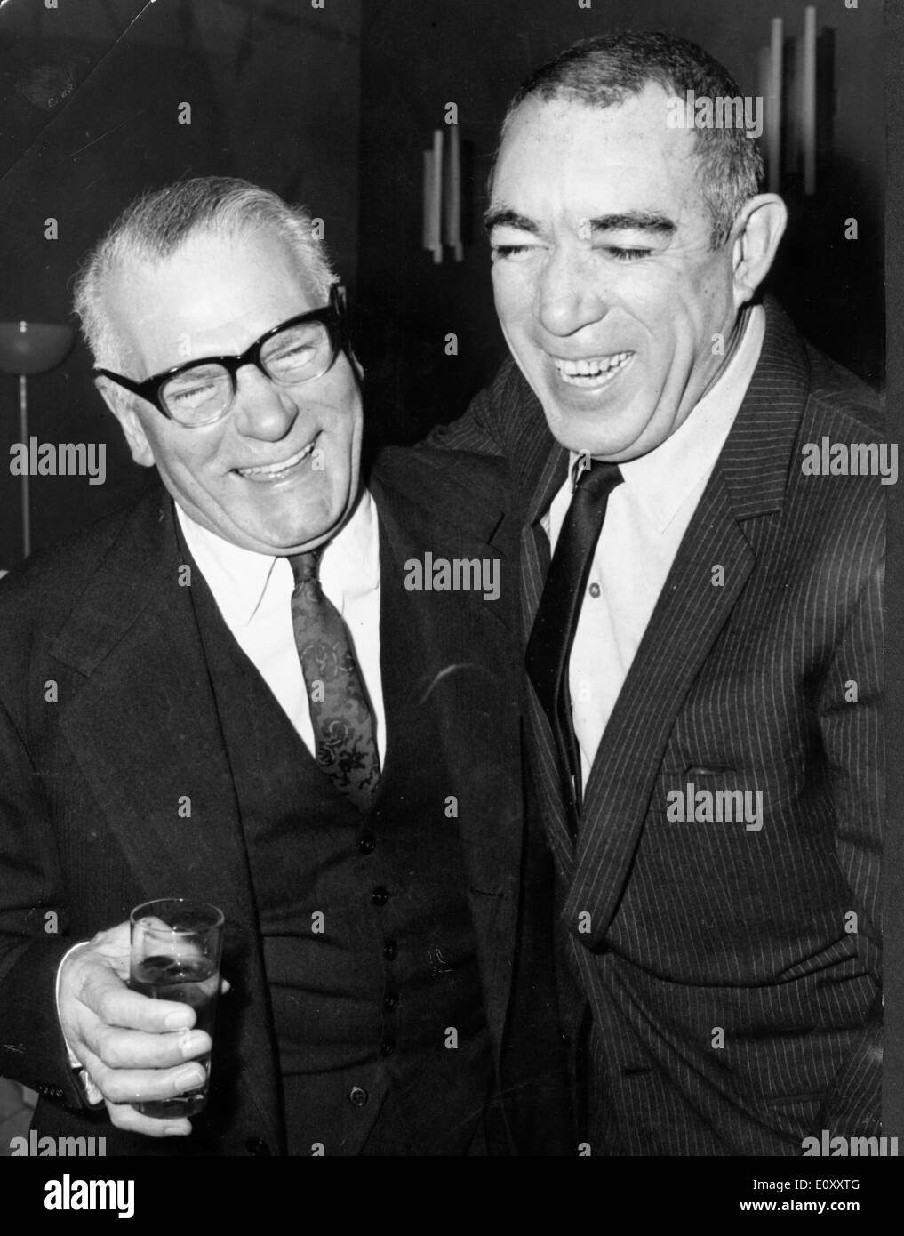 Anthony Quinn and Laurence Olivier at a press conference for a film Stock Photo