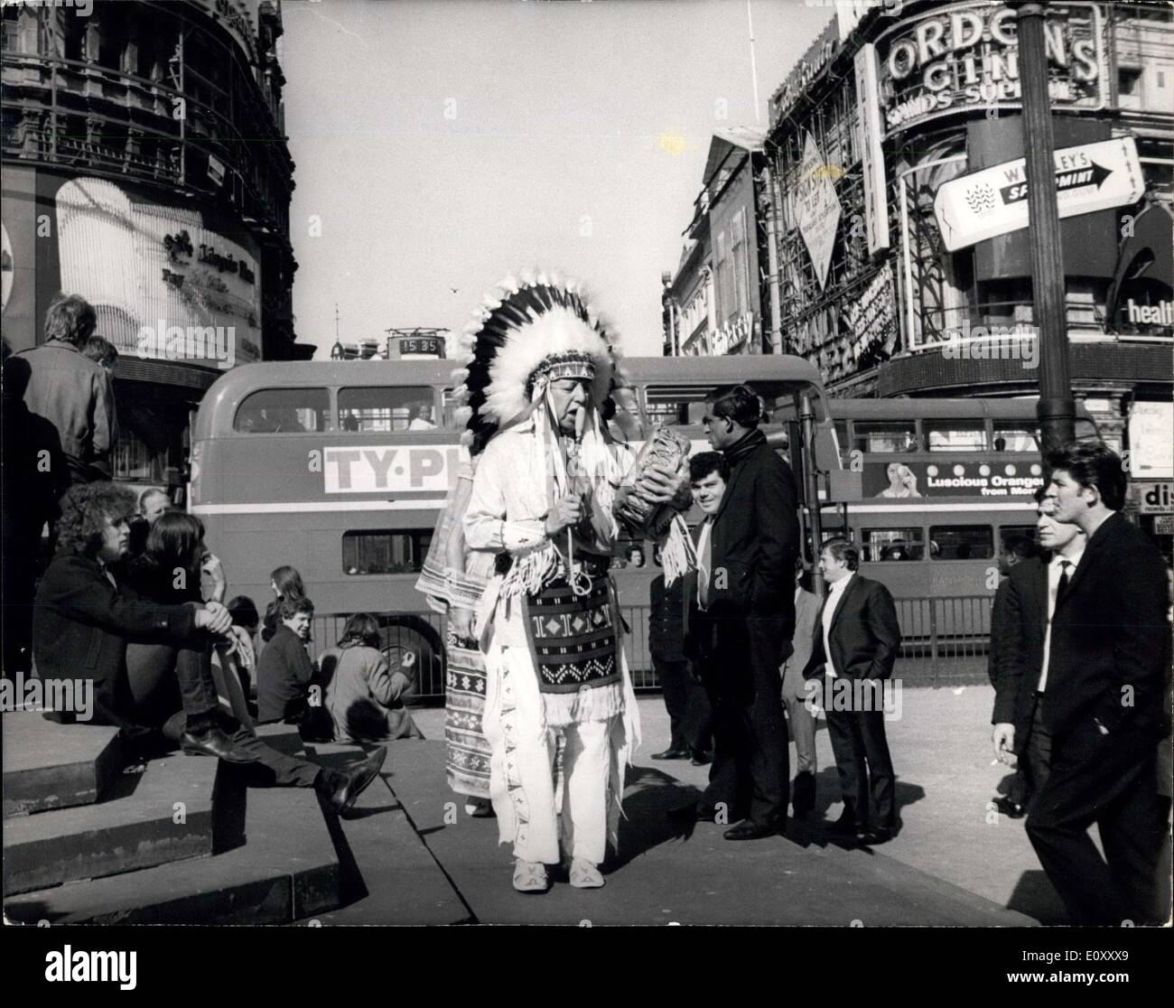 Mar. 26, 1968 - Party of Indians in London on Goodwill visit. Three members of the party of six Indians who are here for three weeks on a goodwill visit sponsored by the U.S. department of Commerce, were out in London today in their national costume. The three are Chief Wolf Robe Hunt, full chief of the Acoma pueblo Indian Tribe. (From Tulea, Oklahoma), Chief Joe Dan Osceola, leader of the Seminoles, Great - great grandson of Chief Osceola, famous war chief of the Seminoles when they fought the United states Stock Photo