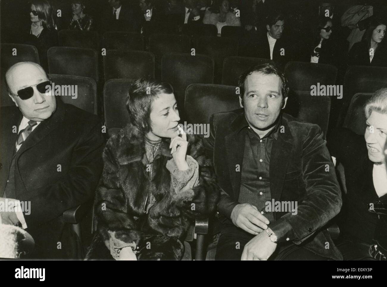 Jan 19, 1968 - Olympia, Greece - JEAN PIERRE MELVILLE and actress ANNIE GIRARDOT, along with her husband actor RENATO SALVATORI, are at the premiere of ''Face au public''. Stock Photo