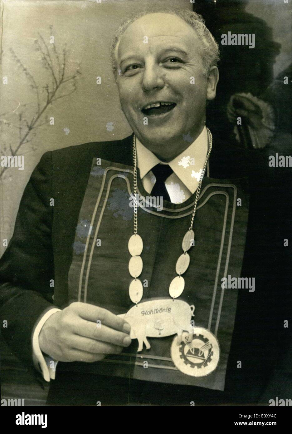 Jan. 23, 1968 - Pictured here is FdP member and opposition chief Walter Scheel, who was designated the ''kohlkonig'' or ''cabbage king'' at a meeting of an economic politicians' club in Bonn. He is rather proud of his new title and is pictured here with a bib and his ''king's order. Stock Photo