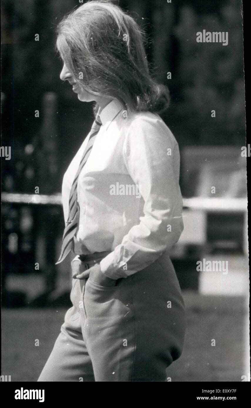 Apr. 04, 1968 - Princess Anne competes in the Windsor horse trials.: Princess Anne was today competing in the Windsor horse trials which were being held an Smith's Lawn, Great Windsor Park. Photo shows princess Anne Sports a ''Veronica Lake'' hairstyle as she walks around inspecting the fences in the show jump event. Stock Photo