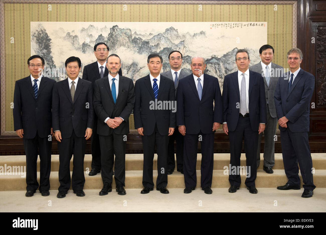 (140520) -- BEIJING, May 20, 2014 (Xinhua) -- Chinese Vice Premier Wang Yang (C, front) meets with a Brazilian delegation headed by Cesar Borges (3rd R, front), Brazil's Minister of State for Transport, and Luciano Coutinho (3rd L, front), president of the Brazilian National Development Bank (BNDES), in Beijing, capital of China, May 20, 2014.  (Xinhua/Xie Huanchi) (zc) Stock Photo