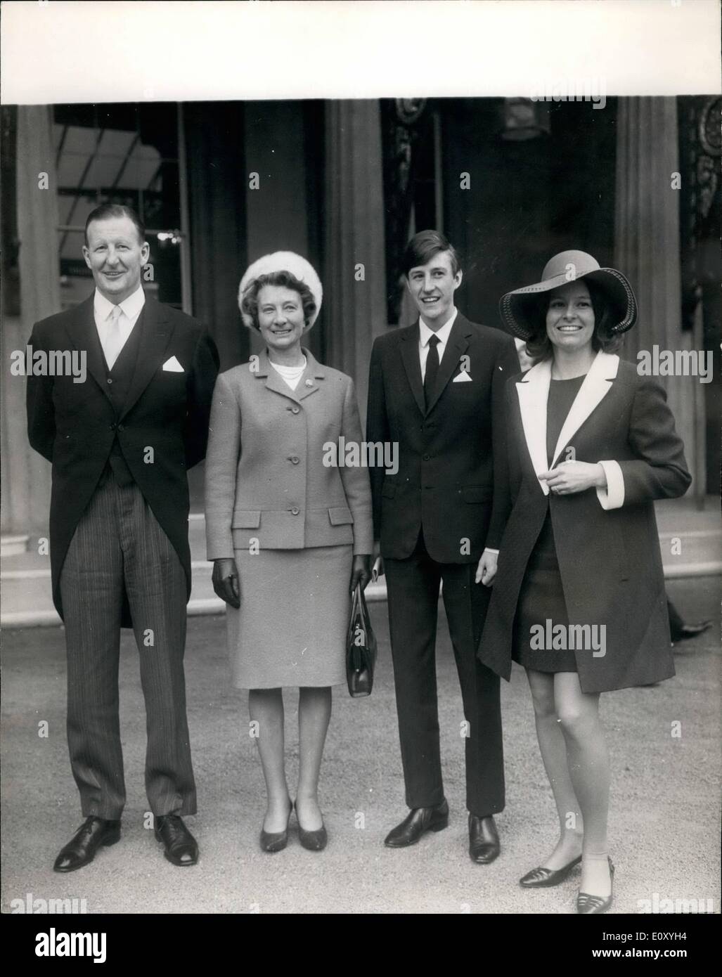 Feb. 02, 1968 - INVESTITURE AT THE PALACE, BIPPA PHOTO SHOWS:- SIR ATHELSTAN JACK SCAMP Chairman, Motor Industry Joint Labour Council, who was Knighted in the New Year's Homurs List, pictured em left, after today's Investiture at the Palace with his wife, LADY JANE SCAMP, his son, MR. JOHN SCAMP, and. his daughter, MRS. JENNIFER HILL. Stock Photo