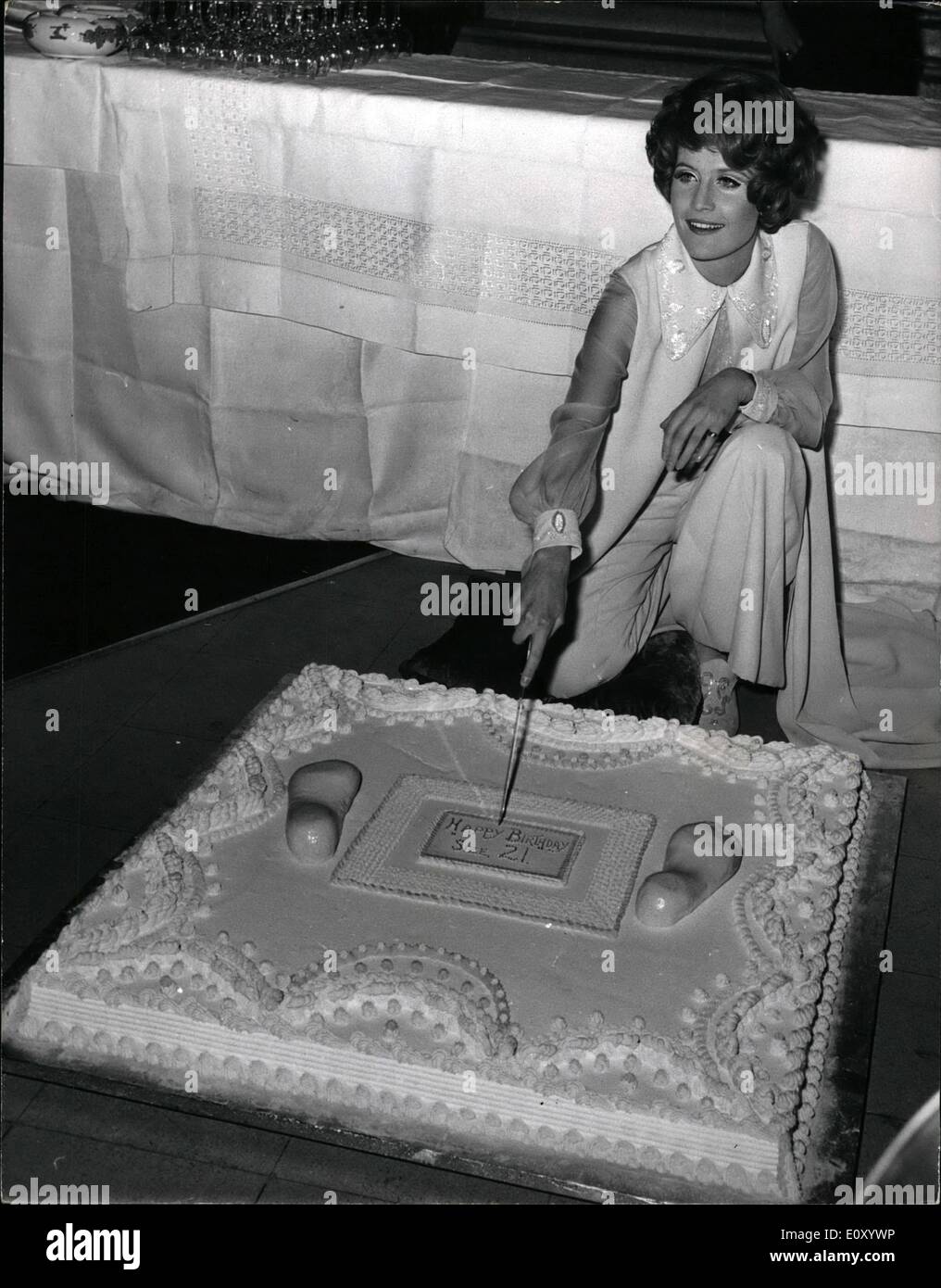Feb. 02, 1968 - Sandie Shaw Holds 21st Birthday Party at Madame Tussauds: Singer Sandie Shaw celebrated her 21st. birthday at midnight a party in the Chamber of Horrors at Madame Tussauds. In recognitions of her now celebrated barefoot style of singing, her birthday cake was decorated with barefoot in icing. Sandie hired the Chamber of Horrors at Madame Tussauds for 500 guineas, and invited her guests to mingle with the life like effigies of Heath, Haigh and Crippen.Photo Shows Sandie Shaw cut her Birthday cake at Madame Tussauds. Stock Photo