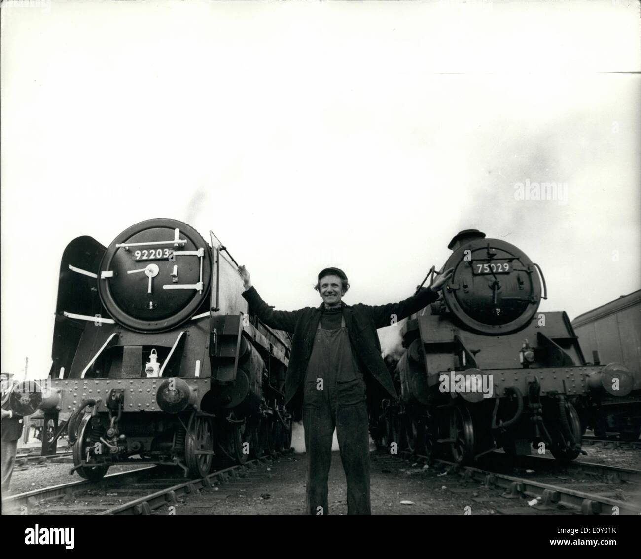 Apr. 04, 1968 - Artist Buys Two Locomotives from British Rail. Following a highly successful exhibition of his wild life paintings, the well known artist, David Shepherd, whose two main interests in life are railways and the preservation of wild life, has purchased two steam locomotives from British Railways. This weekend the two locomotives No. 75029, a BR Class 4, and No. 92203, a BR Class 9F, travelled down from Crewe, coupled together, to the British Rail depot at Cricklewood, in North London Stock Photo