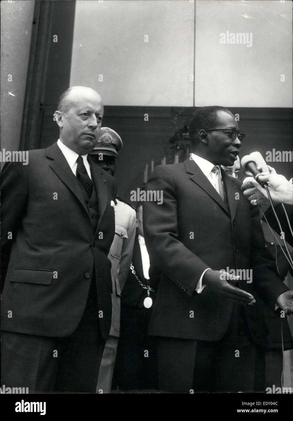 Apr. 18, 1968 - President Leopold Senghor gave an interview to reporters as he left the Elysee Palace weher he had lunch with General de Gaulle. Secretary General of African Affairs, Jacques Foccart is standing next to him. Stock Photo