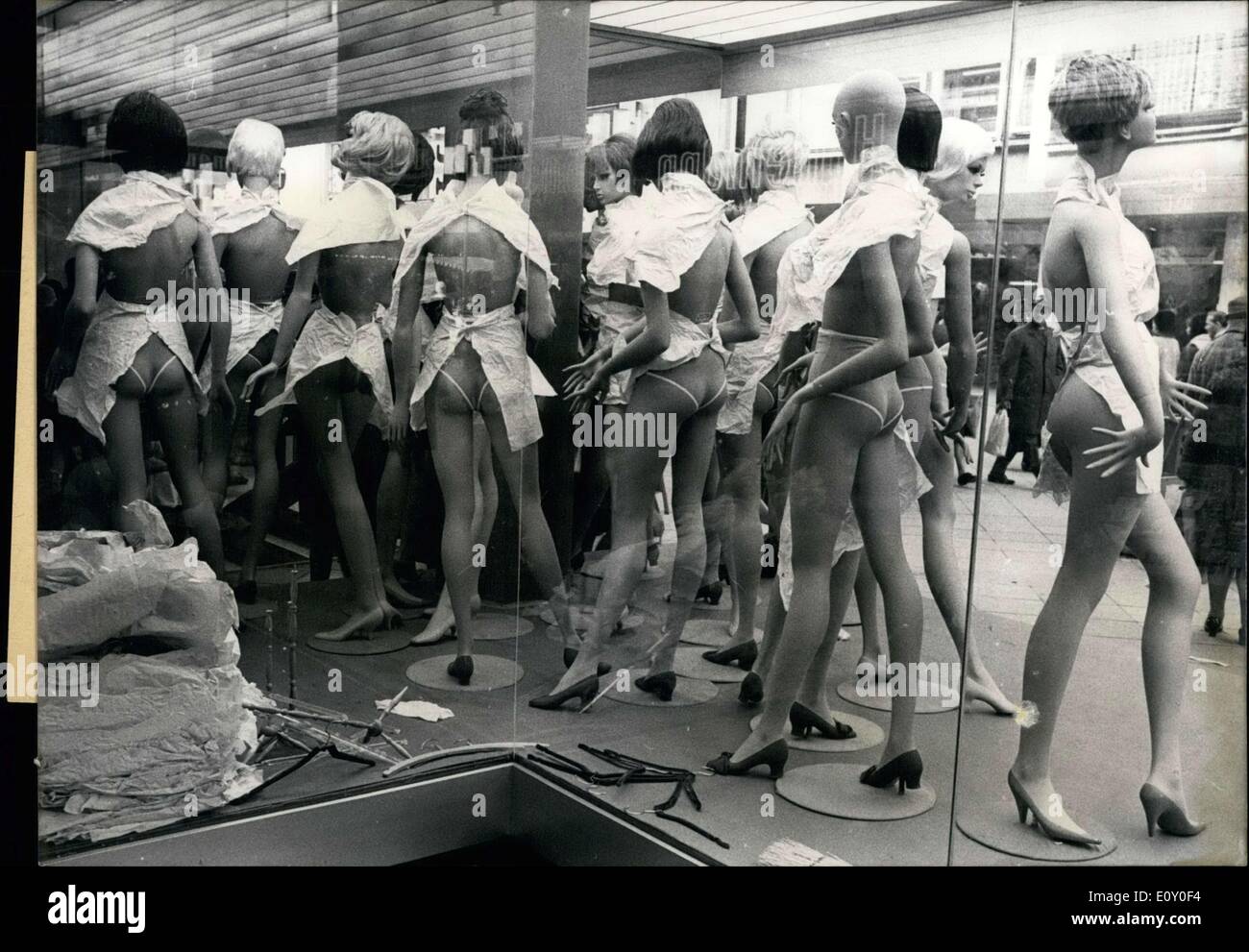 Feb. 06, 1968 - Our photographer discovered a ''scantily clad'' group of ''young woman'' on a well-known street in K?ln! They are shown there wide-open. Someone, or some people, had torn the clothes from their bodies. But these mannequins aren't victims of bad blokes, but rather women in a buying frenzy. The shoppers were after the cheap clothes on the mannequins, which were on sale. Sales are serious business! Stock Photo